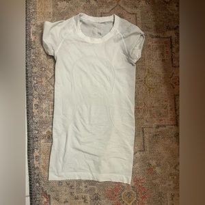 White lululemon swiftly tech short sleeve shirt, size 2. Like new.